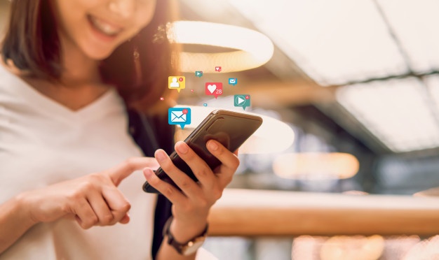 social-media-digital-online-smiling-asian-woman-using-smartphone-show-technology-icon_2034-1761